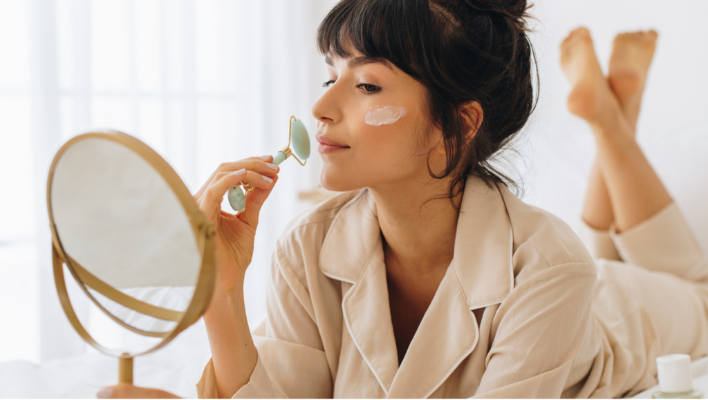 Woman relaxing giving herself a facial 